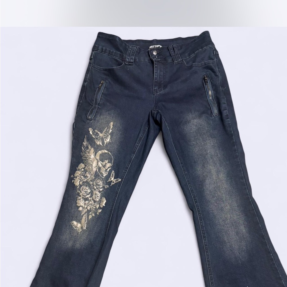 Women's dark wash  Boot Cut Jeans with Gold skull/cross design !